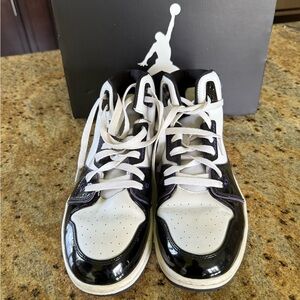 Nike Jordan Black and White High-Top Sneakers